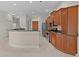 Bright kitchen with granite countertops and stainless steel appliances at 1721 Sunset Ridge Dr, The Villages, FL 32162