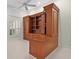 Office with a custom built-in desk and shelving, providing ample storage and workspace at 1721 Sunset Ridge Dr, The Villages, FL 32162