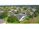 Back of a comfortable house with a green lawn in a beautiful residential area at 1721 Sunset Ridge Dr, The Villages, FL 32162