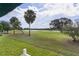 Stunning golf course views from the backyard enhance the property's appeal and value at 1721 Sunset Ridge Dr, The Villages, FL 32162