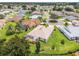 An aerial view of the rear of the home highlighting the screened in lanai at 1875 Saybrook Way, The Villages, FL 32162