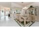 Spacious dining room featuring bright light and access to the kitchen at 1875 Saybrook Way, The Villages, FL 32162