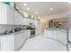 Large open kitchen with sleek appliances, ample counter space, and great natural light at 1875 Saybrook Way, The Villages, FL 32162