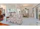 Open concept living area with tile flooring and open access to the kitchen and dining room at 1875 Saybrook Way, The Villages, FL 32162