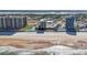Beautiful aerial view featuring the beach, ocean, and beachfront condo buildings at 1909 S Atlantic Ave # 311312, Daytona Beach, FL 32118