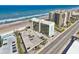 Aerial view of the Oceanside Inn building near the beach at 1909 S Atlantic Ave # 311312, Daytona Beach, FL 32118
