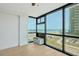 Living room with floor to ceiling windows and ocean view at 1909 S Atlantic Ave # 311312, Daytona Beach, FL 32118