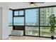 Living room with floor to ceiling windows and ocean view at 1909 S Atlantic Ave # 311312, Daytona Beach, FL 32118