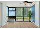 Living room with floor to ceiling windows and ocean view at 1909 S Atlantic Ave # 311312, Daytona Beach, FL 32118