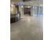 View of a modern lobby featuring tile flooring and a wood reception desk at 1909 S Atlantic Ave # 311312, Daytona Beach, FL 32118