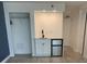 Bright room with a closet and a kitchenette with a mini-fridge at 1909 S Atlantic Ave # 311312, Daytona Beach, FL 32118