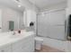 Clean and bright bathroom featuring a shower, vanity, and ample storage space at 2128 Alfredo Ave, Lady Lake, FL 32159