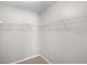 Walk-in closet with metal shelving at 2128 Alfredo Ave, Lady Lake, FL 32159