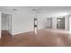 Large living room with hardwood floors and views to other areas of the home at 2128 Alfredo Ave, Lady Lake, FL 32159