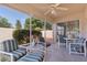 Screened patio with seating area, perfect for relaxing and entertaining at 2128 Alfredo Ave, Lady Lake, FL 32159