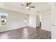 Spacious bedroom with modern flooring, ample light, and ensuite bathroom at 2139 Kaylee Dr, The Villages, FL 32162