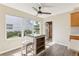 Bright breakfast nook with natural light, ceiling fan and view to the outside at 2139 Kaylee Dr, The Villages, FL 32162