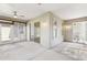Covered patio boasting a fan, sliding doors, and an open design perfect for outdoor enjoyment at 2139 Kaylee Dr, The Villages, FL 32162