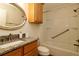Bathroom featuring a vanity with granite countertop, tub, shower, and built in storage cabinet at 2449 Kingstree Pl, The Villages, FL 32162