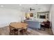 Spacious area showing the kitchen, living, and dining areas at 24802 Pine Hl, Leesburg, FL 34748