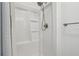 Shower stall with chrome shower head and built in shelves at 24802 Pine Hl, Leesburg, FL 34748