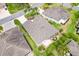 Aerial view of the home showing landscaping, hardscape features, and surrounding neighborhood at 2669 Halsey Ter, The Villages, FL 32162