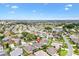 Wide aerial view of the home within the neighborhood community and golf course at 2669 Halsey Ter, The Villages, FL 32162