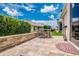 Comfortable outdoor seating area and view of well-manicured private back yard at 2669 Halsey Ter, The Villages, FL 32162