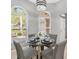 Bright breakfast nook with natural light and contemporary table set at 2669 Halsey Ter, The Villages, FL 32162