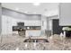 Gourmet kitchen with granite countertops, stainless steel appliances and ample cabinet space at 2669 Halsey Ter, The Villages, FL 32162