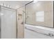 Shower stall features glass doors, tiled walls, and dual shower heads at 2669 Halsey Ter, The Villages, FL 32162