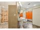 Unique bathroom design with saloon doors, pedestal sink, and a separate shower area at 300 Carol Ann Dr, Edgewater, FL 32132