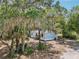 Charming single-story home surrounded by lush trees at 300 Carol Ann Dr, Edgewater, FL 32132