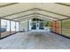 Covered parking area connected to metal home at 300 Carol Ann Dr, Edgewater, FL 32132