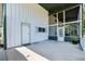 Exterior of metal home and covered parking area at 300 Carol Ann Dr, Edgewater, FL 32132