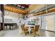 Open garage space with high ceilings, concrete floor, and potential for various uses at 300 Carol Ann Dr, Edgewater, FL 32132