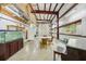Large garage with an aquarium, piano, and comfortable seating, designed for a variety of uses at 300 Carol Ann Dr, Edgewater, FL 32132