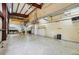 Spacious garage with high ceilings, overhead lighting, and ample room for storage and parking at 300 Carol Ann Dr, Edgewater, FL 32132
