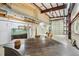 Large garage with a piano, aquarium, and seating area, perfect for entertainment or hobbies at 300 Carol Ann Dr, Edgewater, FL 32132