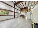 Large garage featuring concrete floors, steel beams, natural light, and open space at 300 Carol Ann Dr, Edgewater, FL 32132