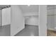 Versatile basement space with tiled flooring and access to a full bathroom at 3055 Wolf Branch Rd, Mount Dora, FL 32757