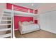' bedroom featuring a bunk with closet, bright colors, and hardwood floors at 3055 Wolf Branch Rd, Mount Dora, FL 32757