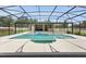 Beautiful pool area with a covered lanai perfect for outdoor relaxation and entertaining at 3055 Wolf Branch Rd, Mount Dora, FL 32757