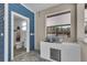 Pool house bathroom and kitchen space with white subway tile at 3055 Wolf Branch Rd, Mount Dora, FL 32757