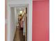 A well-organized walk-in closet with clothing racks and shelving at 3055 Wolf Branch Rd, Mount Dora, FL 32757