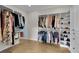 Spacious walk-in closet with custom shelving and ample storage space, designed for optimal organization at 3055 Wolf Branch Rd, Mount Dora, FL 32757