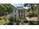 Stunning two-story home with a sophisticated exterior and a well-manicured lawn at 6905 Clayton St, Mount Dora, FL 32757