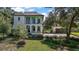 Elegant two-story home featuring classic architectural details and a welcoming front entrance at 6905 Clayton St, Mount Dora, FL 32757