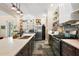 Well-appointed kitchen featuring a large island, stainless steel appliances, and ample counter space, perfect for cooking and entertaining at 6905 Clayton St, Mount Dora, FL 32757