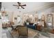 Open-concept living area showcasing seamless flow between the kitchen, dining, and living spaces, perfect for modern living at 6905 Clayton St, Mount Dora, FL 32757